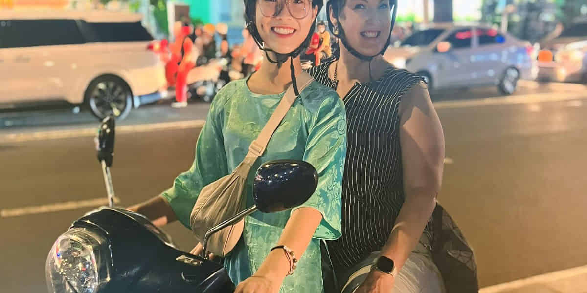 Night Street Tour on Bike with Female Riders on shared transfers